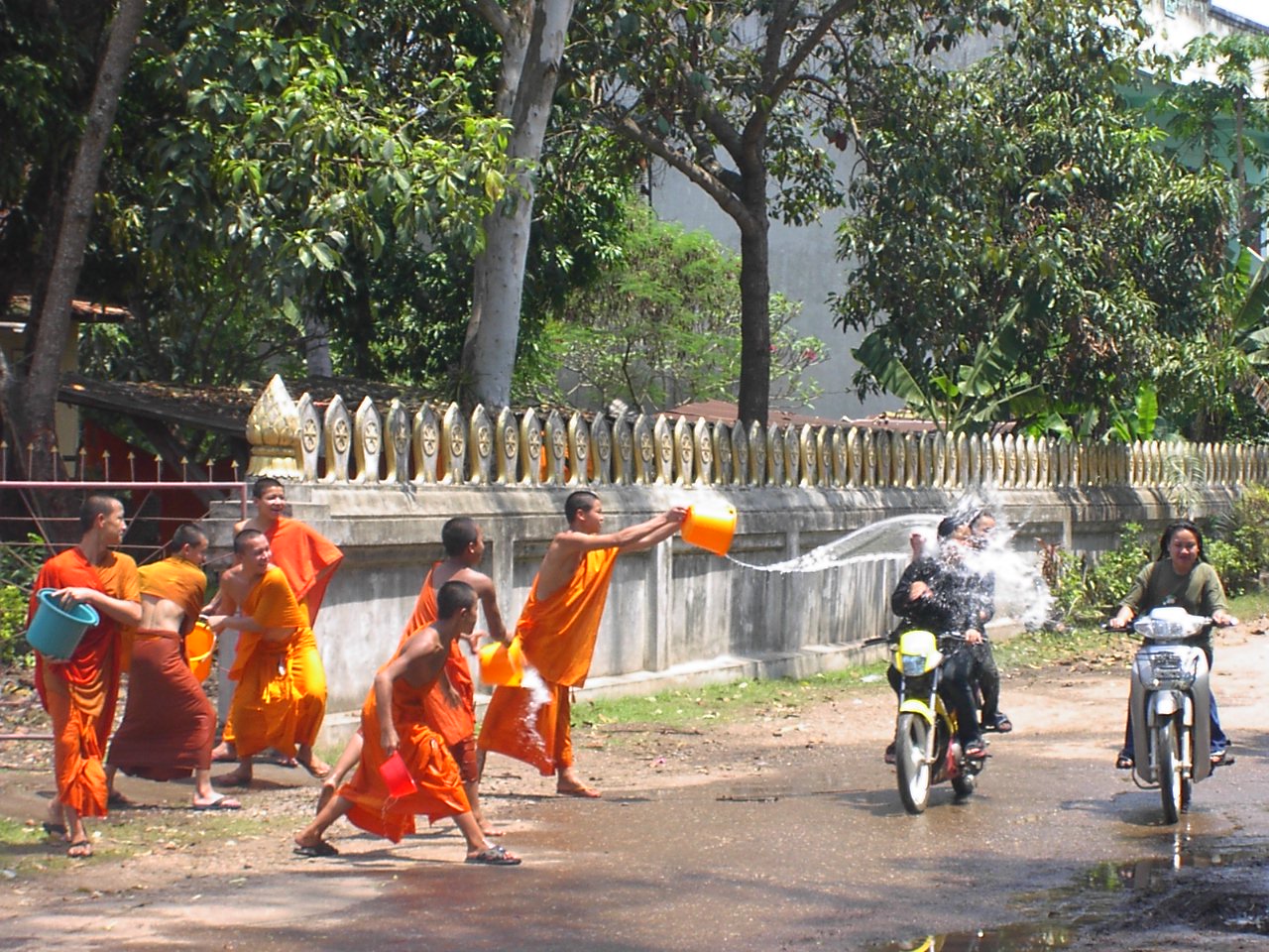 Water throwing in New Year Festival. Monks also enjoy it!