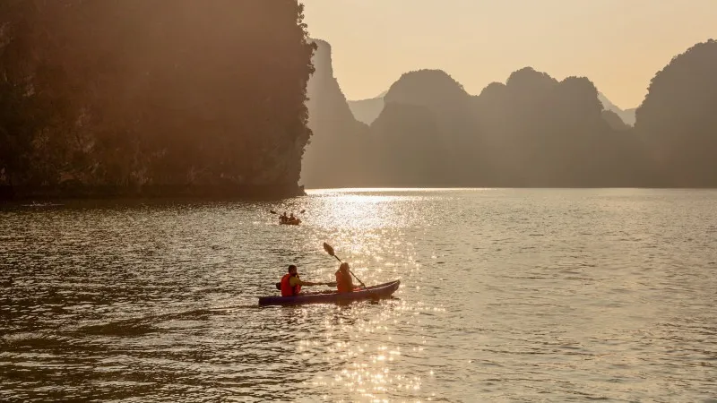 Kayaking under Lan Ha Bay's sunset