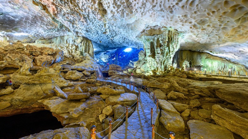 Admire the mesmerizing stalactites and stalagmites of Sung Sot Cave