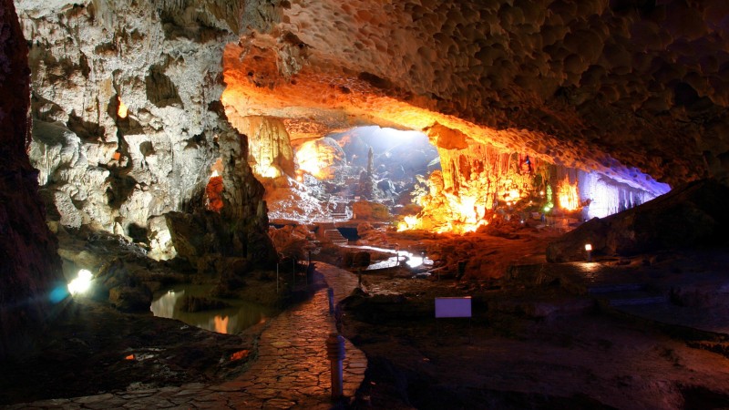 Breathtaking view inside Sung Sot Cave, enhanced by colorful lights