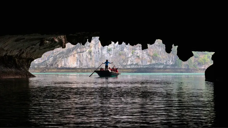 Bamboo Boat At Dark & Bright Caves