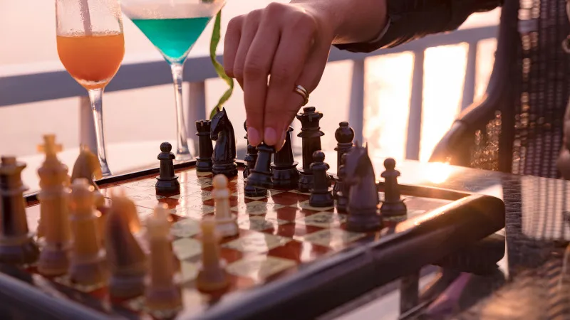 Play chess under the sunset