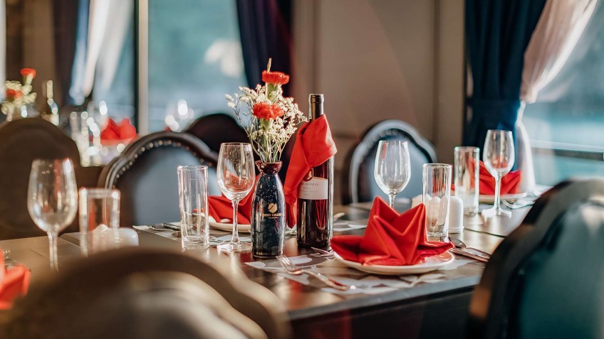 Dining table with high standard