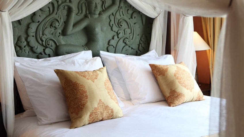 Luxurious White Sheets And Plump Pillows