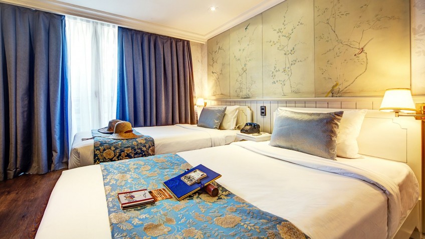 Twin Beds By The Window