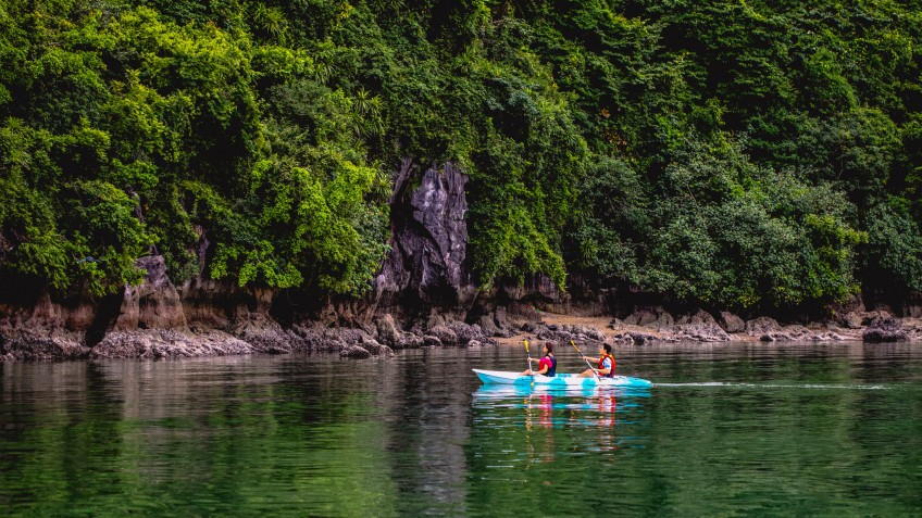 Kayak in secluded part of Halong Bay