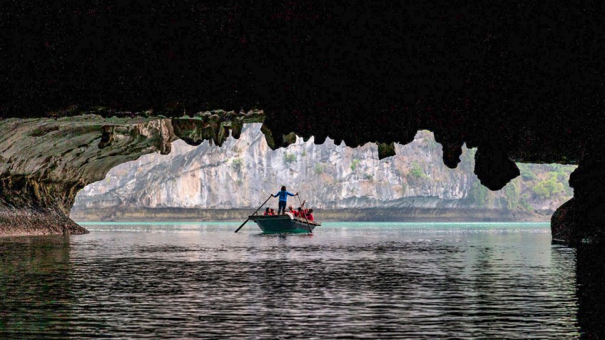 Bamboo Boat at Dark & Bright Cave