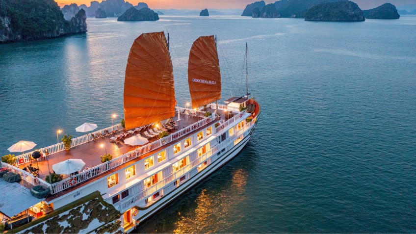 Indochina Sails: Sparkling junk boat amid the bay
