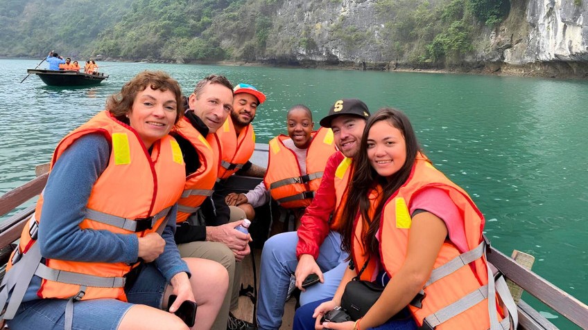 Rowing boat to Dark & Bright Cave