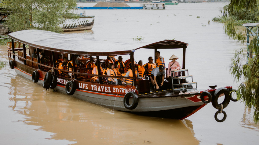 Board A Sampan to Visit Mekong Delta