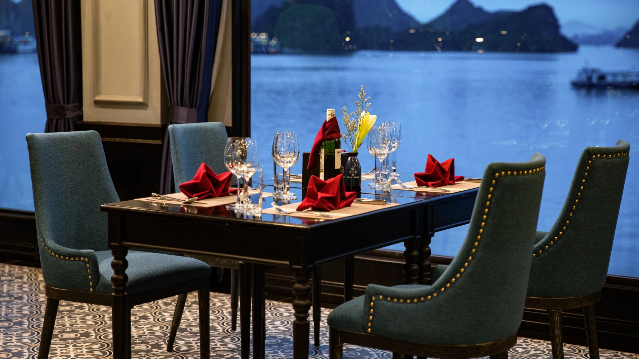 Savor your meals while viewing the scenery through the large floor-to-ceiling windows