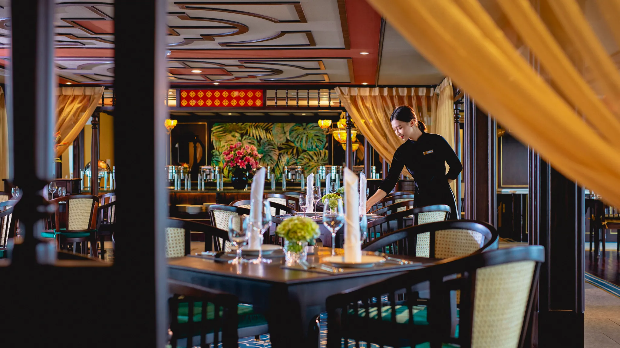 Savor meals in the opulent Tonkin Restaurant