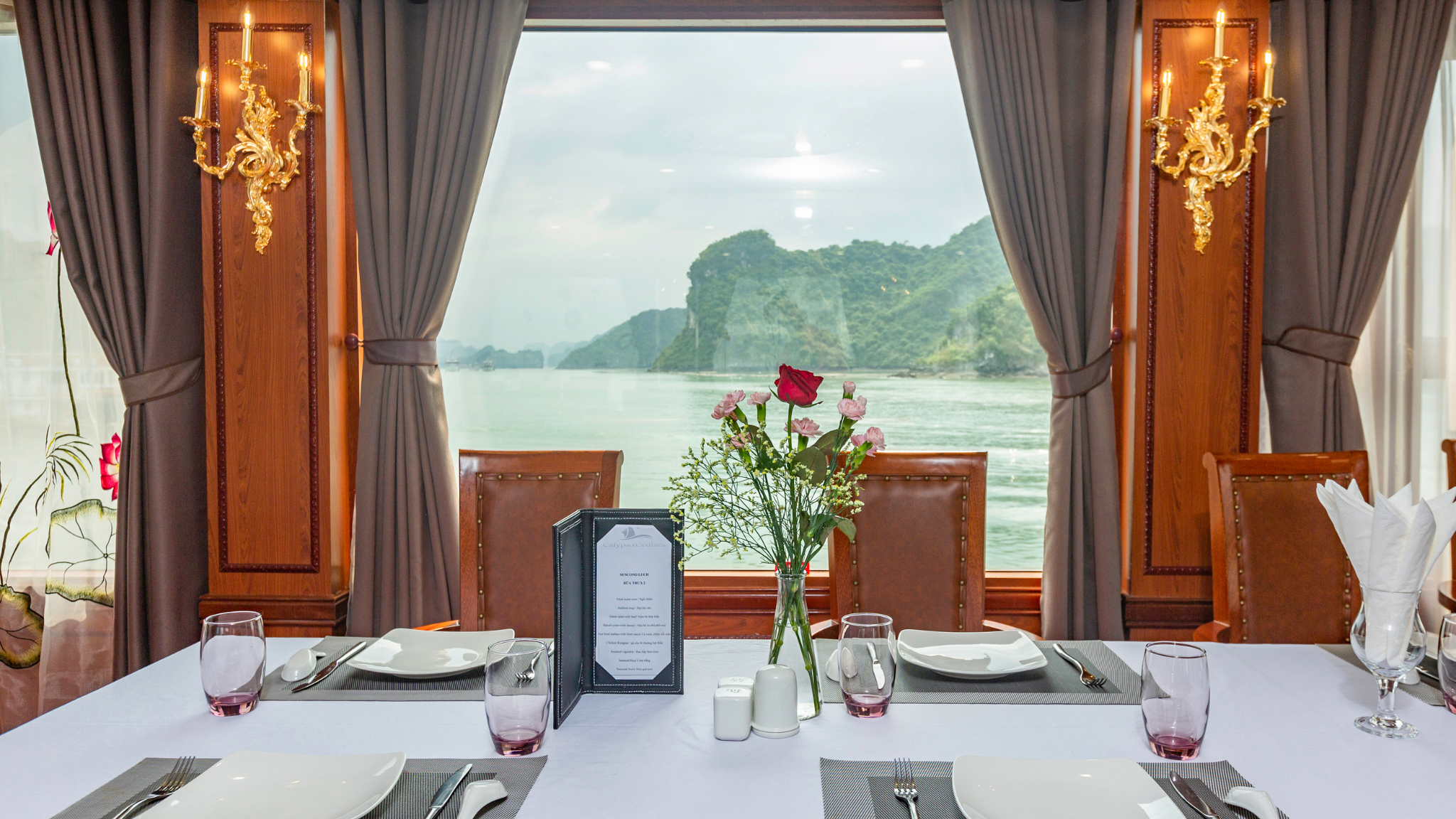 The windows frame breathtaking views of the bay, enhancing the dining experience.