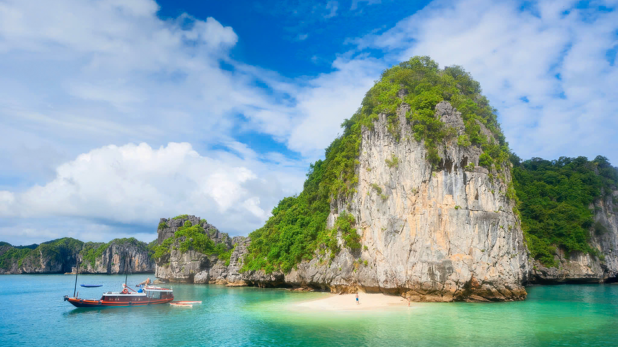 Ba Trai Dao Beach is a perfect spot to immerse yourself in the emerald waters.