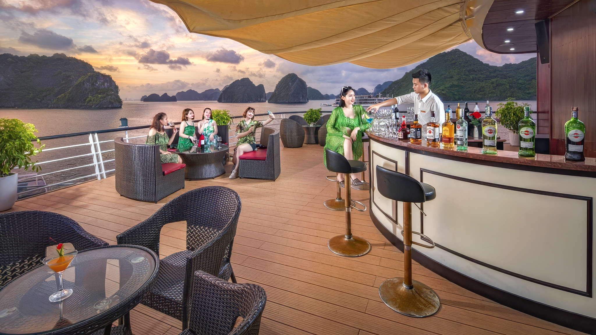 Relax at the sundeck bar with fresh cocktails in hand and sightsee the sunset