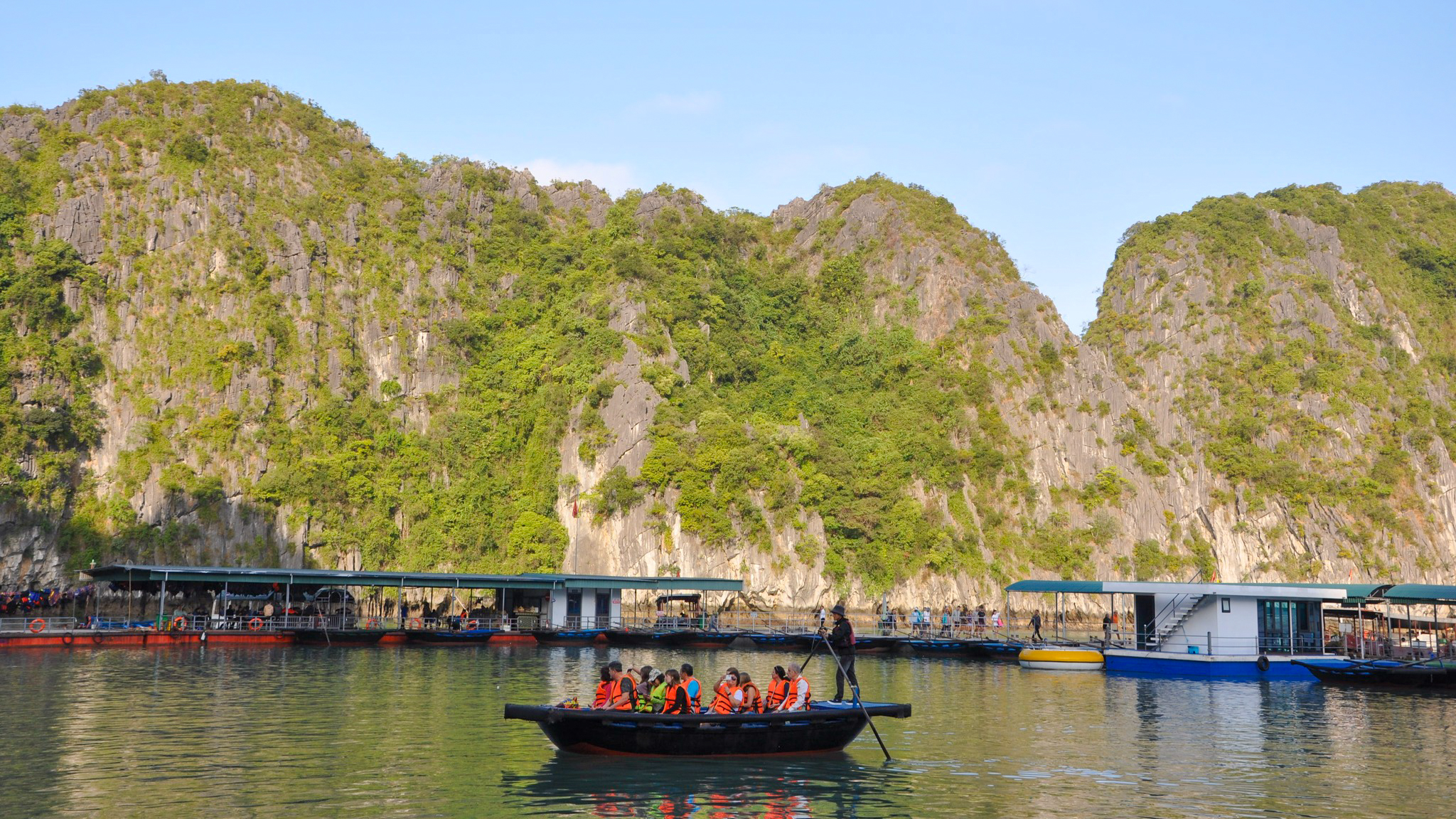 Rowing boat to Dark & Bright Cave