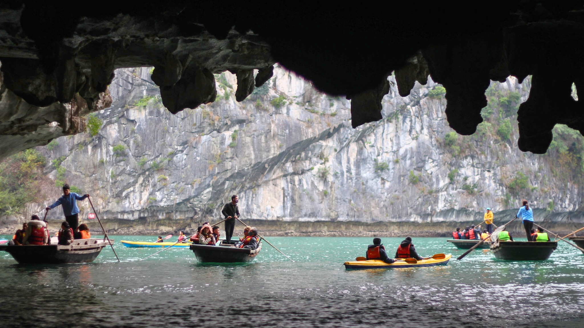 Kayaking through Luon Cave will be a thrilling start for your trip with Hermes Cruise
