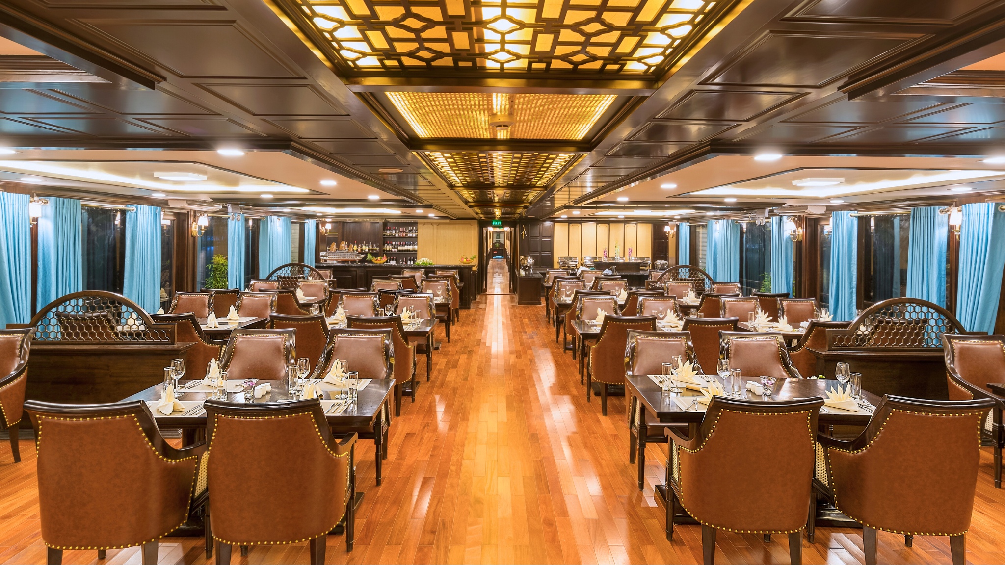 The large dining area with high-end wooden furniture at La Corona restaurant