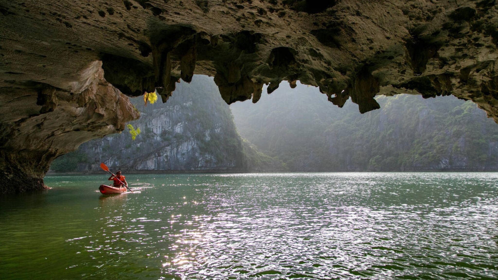Kayaking in Dark and Bright Cave allows you to fully enjoy the serenity of Lan Ha Bay.