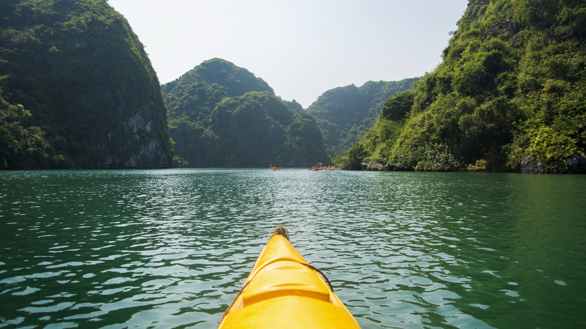 Immerse yourself in the pristine nature while kayaking to Luon Cave