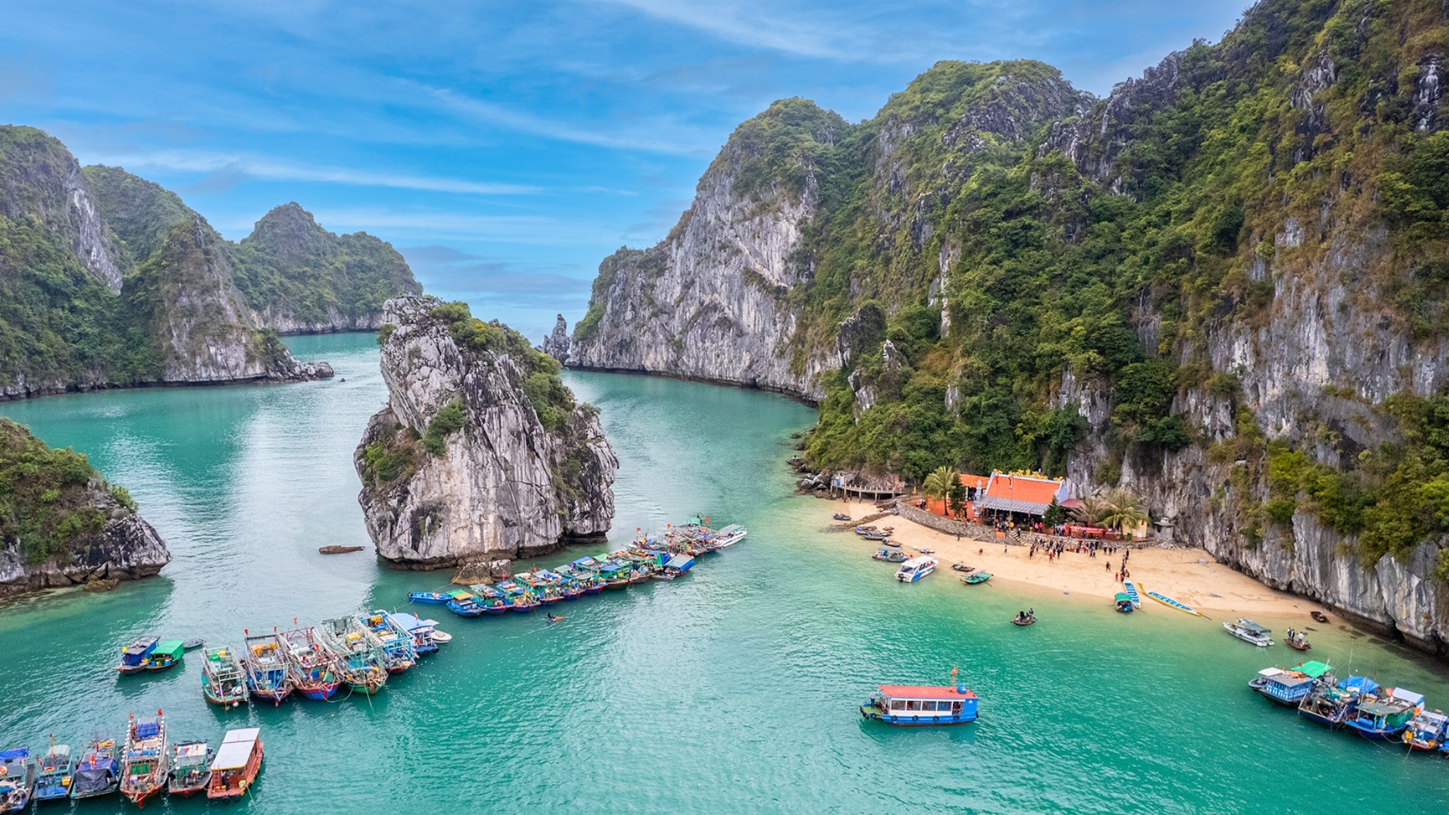 Picturesque temple by the serene beach in Lan Ha Bay
