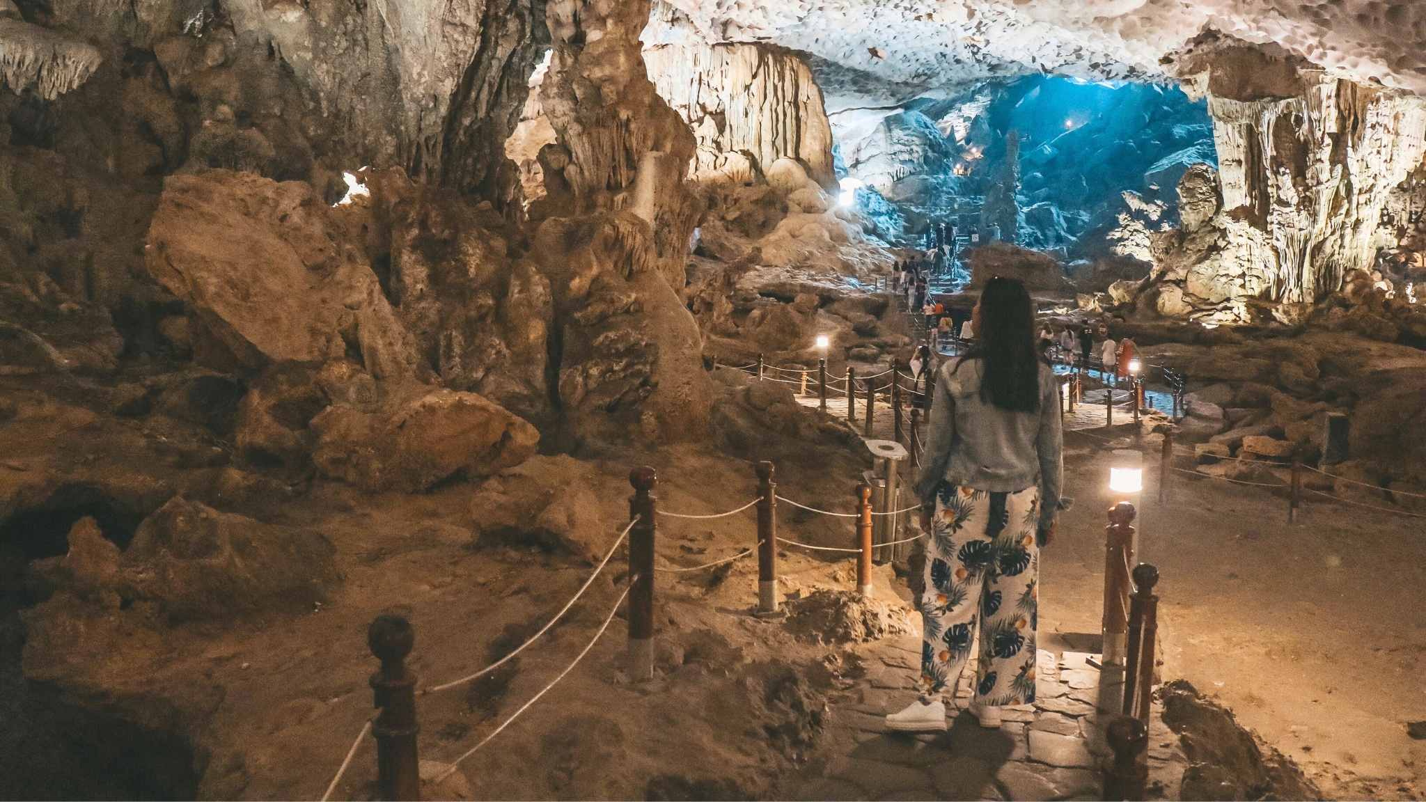 Visitors explore Sung Sot Cave will be in awe of the unique rock formations