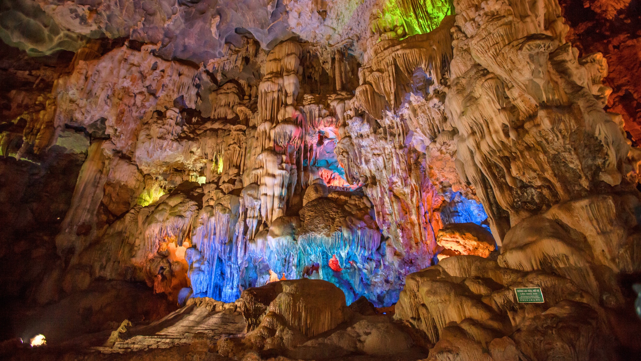 The breathtaking view inside Sung Sot Cave, enhanced by colorful lights