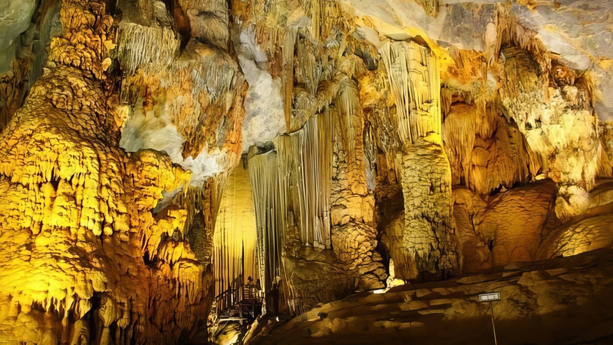 Me Cung Cave offers an up-close view of intricate rock formations and structures