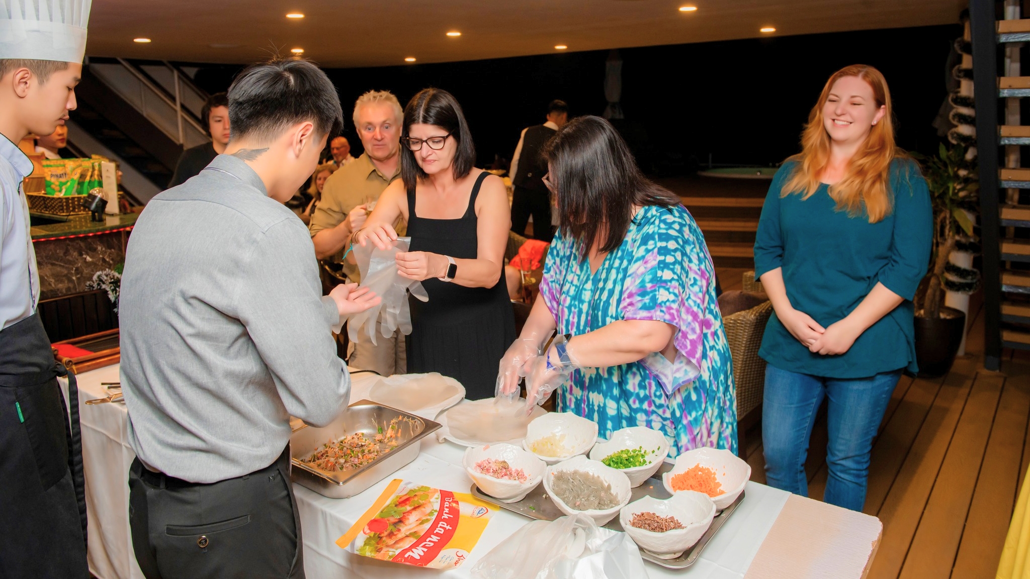 Making deep-fried Vietnamese spring rolls is one of the best activities onboard.
