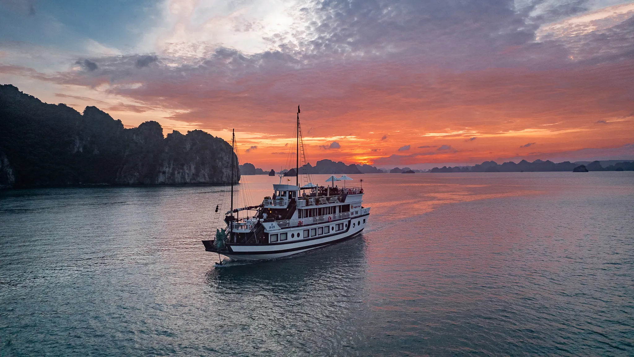 Fiery sunset on Bai Tu Long Bay