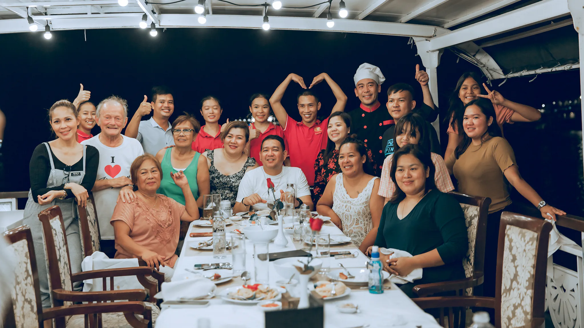 Family Members Enjoy Dinner Party