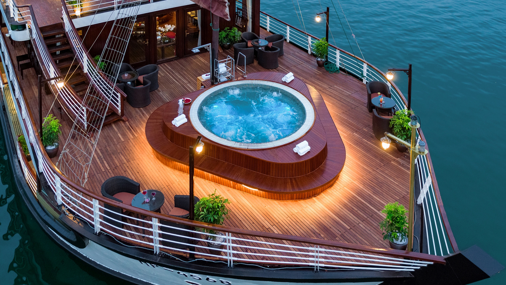 The outdoor jacuzzi provides a refreshing escape with panoramic 360-degree bay views.
