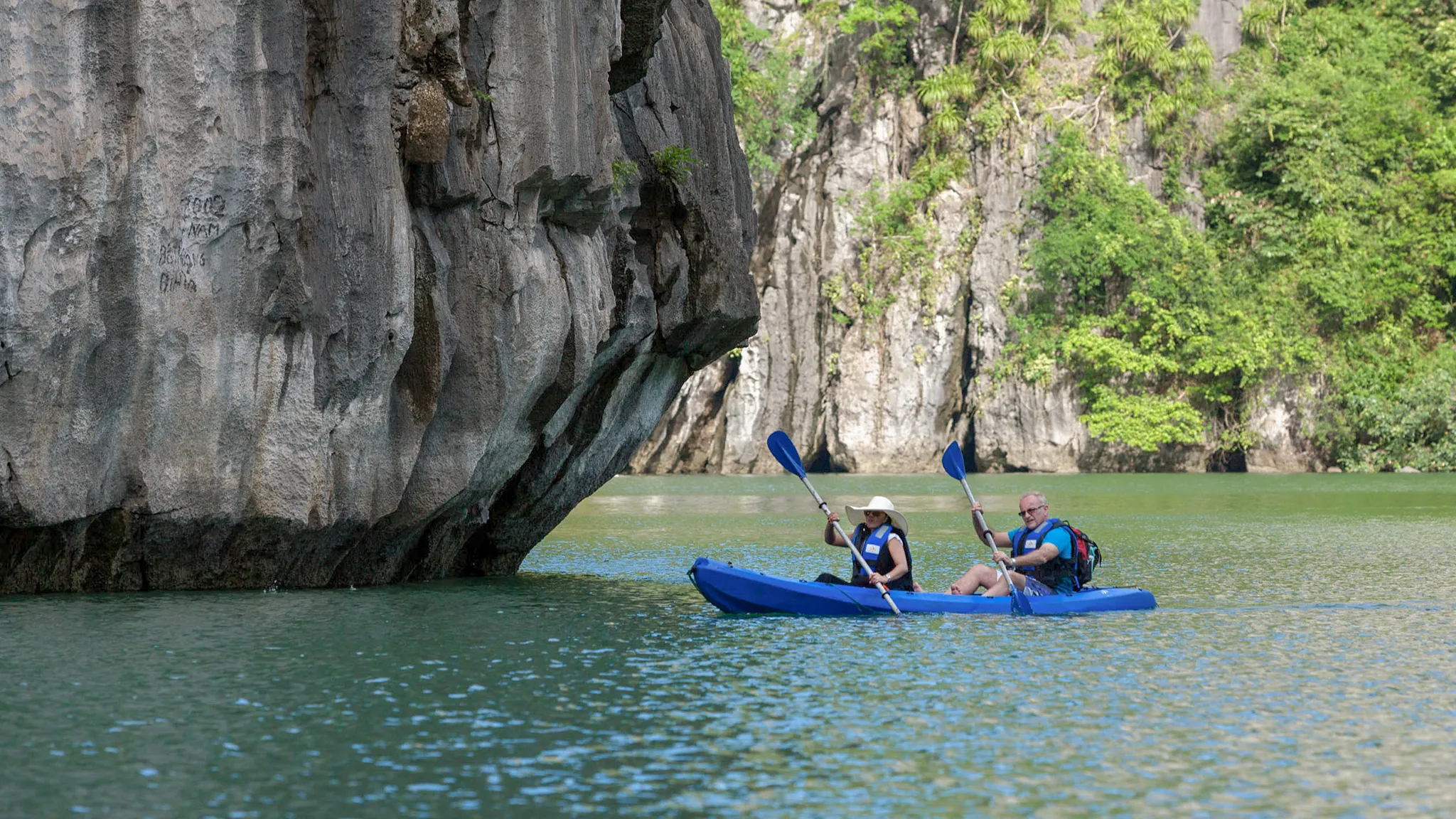 Kayaking through limestones on the sea