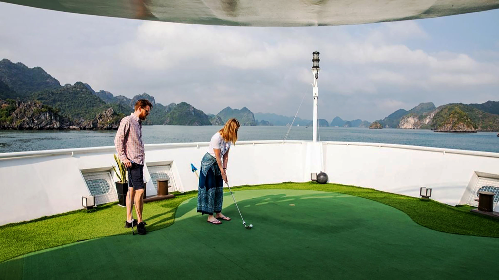 Playing Mini Golf On Sundeck