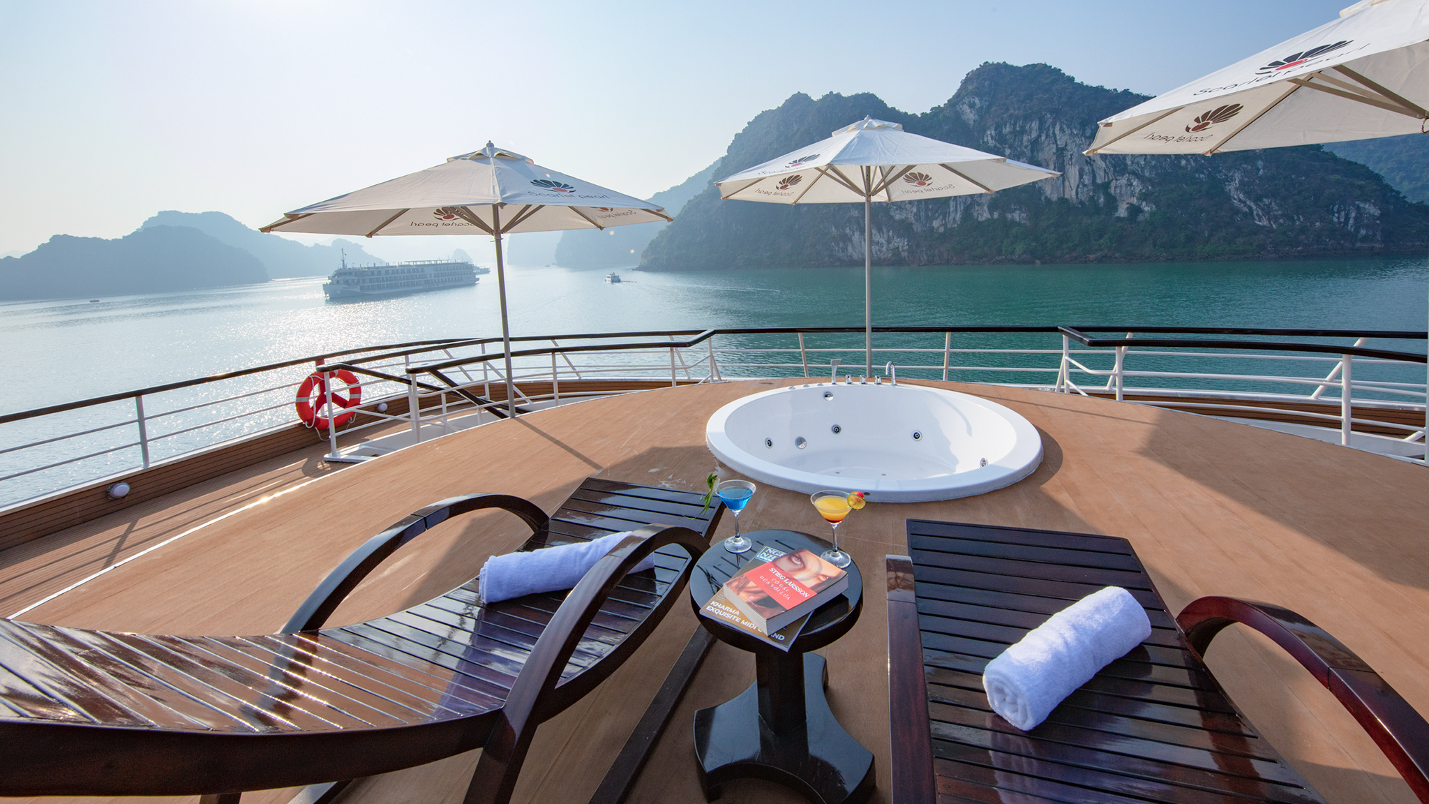 Unwind at the jacuzzi on sundeck after a day of excursions