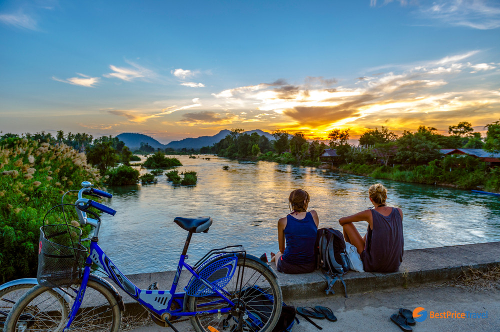Tourists Looking At The Mekong River