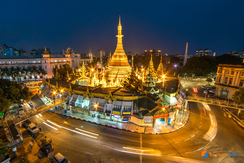 The glowing Sule Pagoda at night