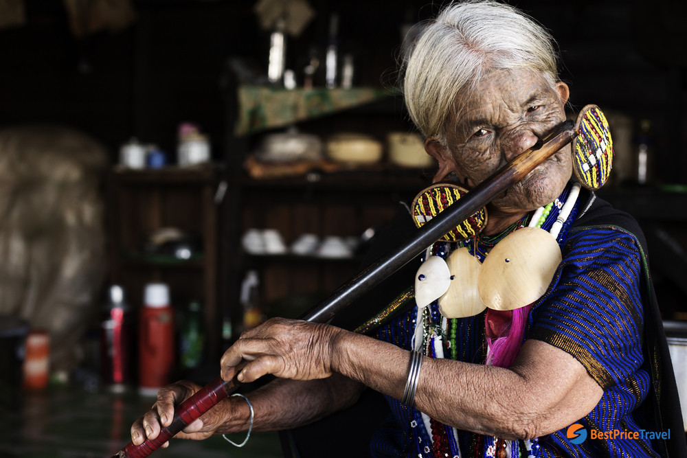 The unique Chin women with tattooed face