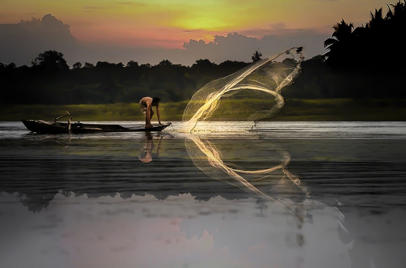 Catching Fish In Ba Lai River