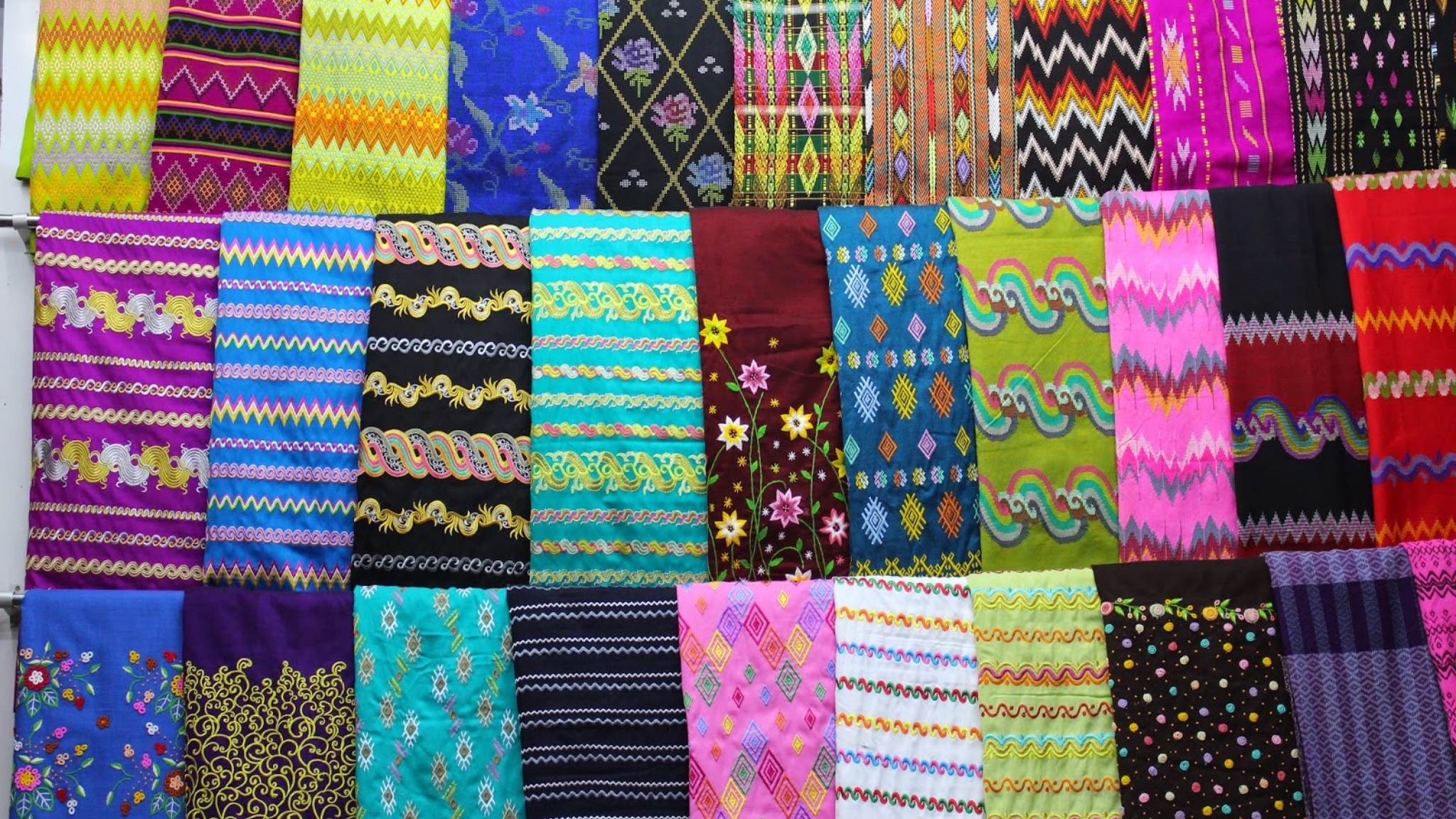 Embroidered Textiles With Colorful Patterns