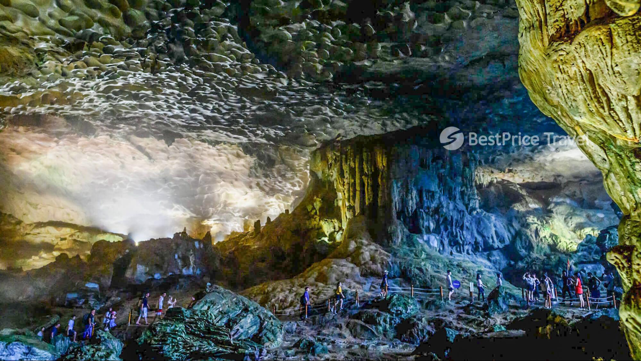The vast chamber inside Sung Sot Cave filled with dramatic rock formations