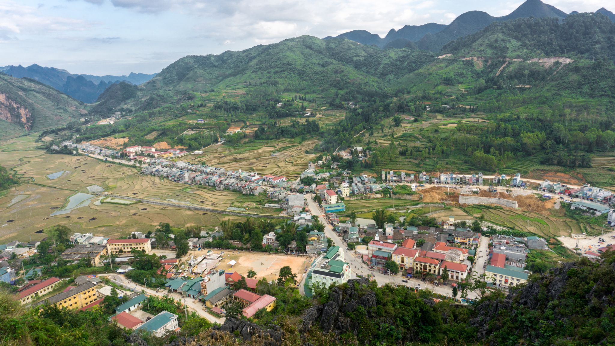 Dong Van Town Is A Charming Highland Town Surrounded By Rugged Mountains And Limestone Cliffs