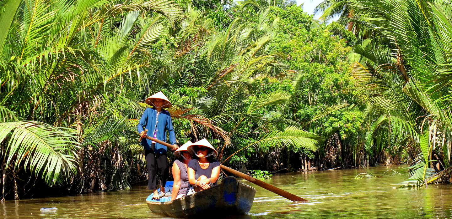 Try a Sampan boat trip in Mekong Delta