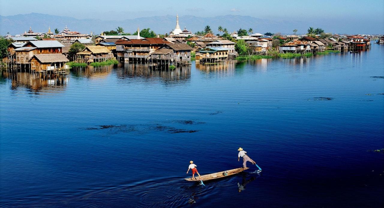 The serenely picturesque Inle Lake, famous for its floating villages, gardens and markets and the unique way of life. 