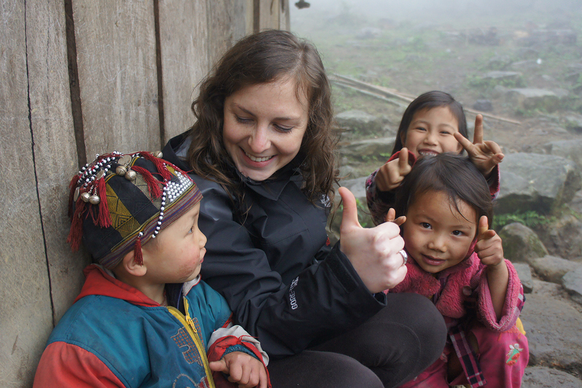 Travelers make friend with lovely kids during a rural homestay experience in Sapa