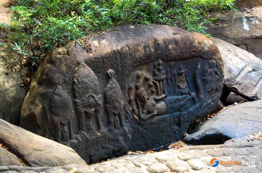 A carving depicts Reclining Vishnu