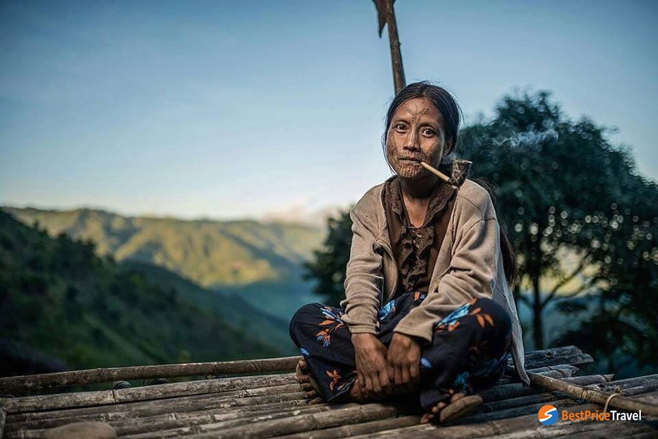 Ethnic Chin woman with her tattooed face