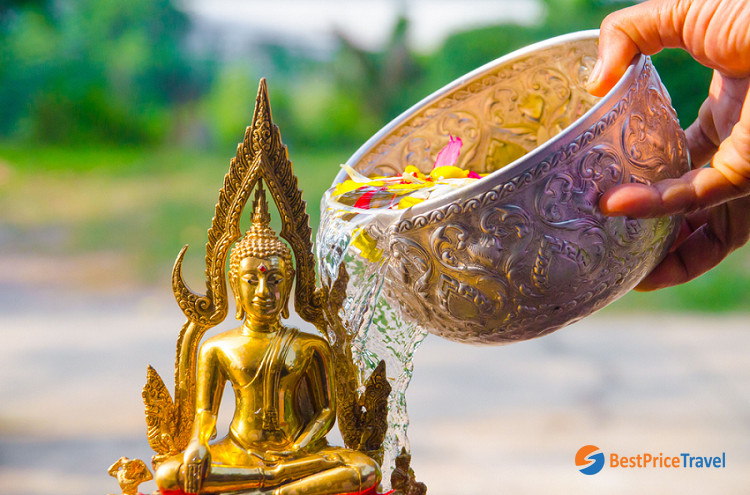 Perfumed water prepared for Buddha statue bathing
