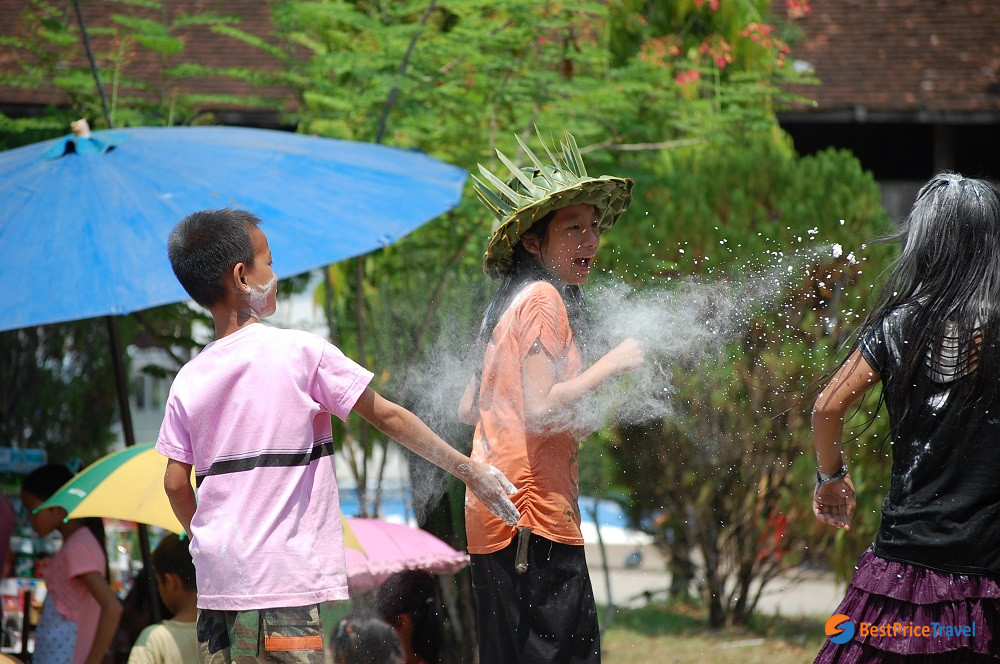 Flour throwing in Laos New Year