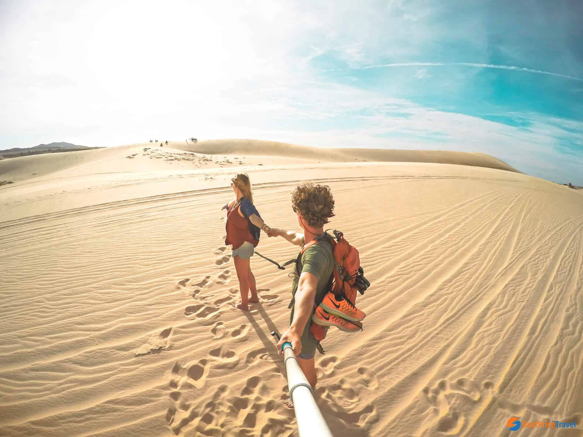 Take travel photos at the impressive dunes in Mui Ne